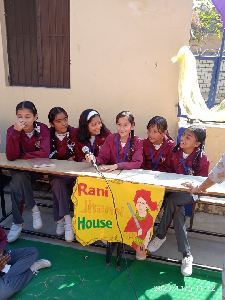 Students presenting a class project, Rani Jhansi House